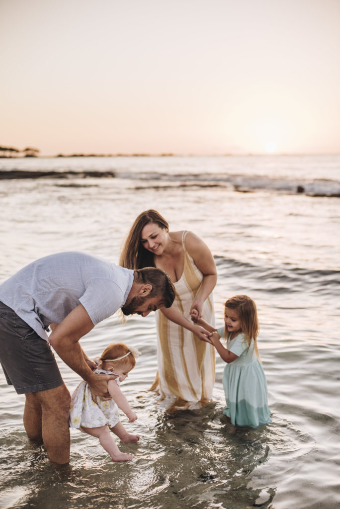 family photoshoot on the beach